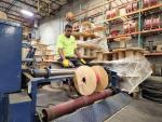 Wesco employee cutting wire in Kansas City, Kansas.